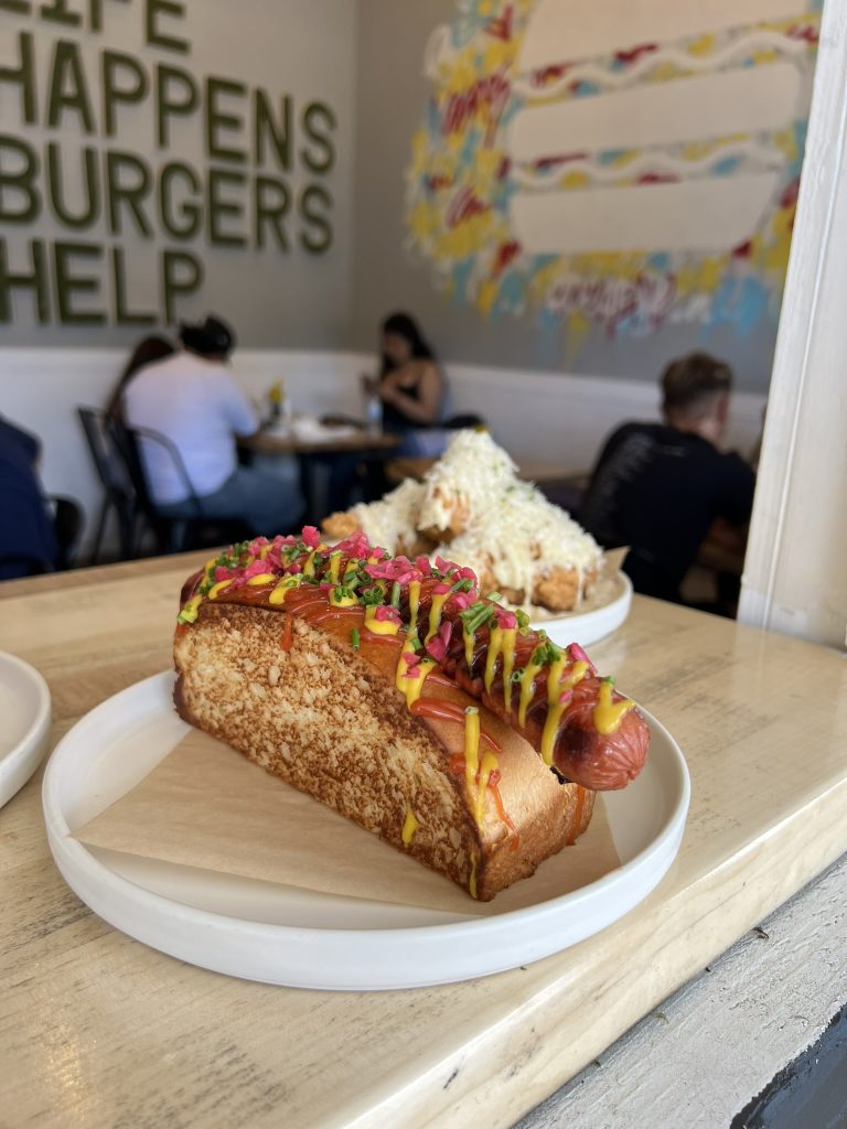 a beef frank in a brioche bun